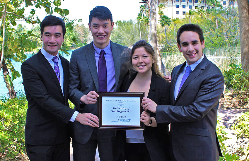 The winning team with their award