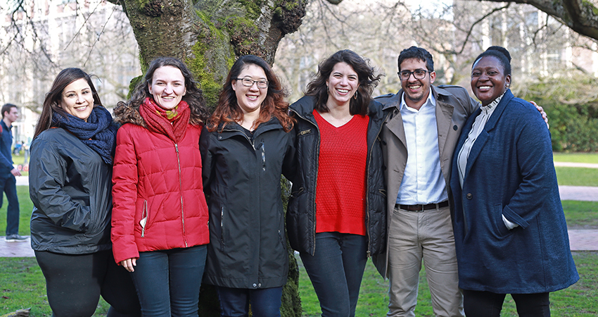 Six students standing in the quad