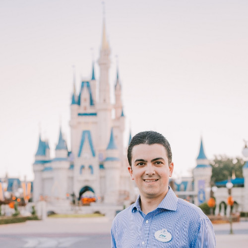 Jose Melendez in front of the Disney Castle
