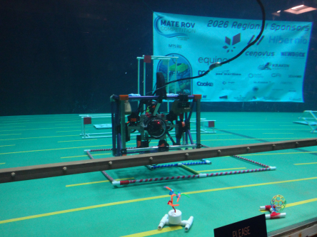 Conduit remotely operated vehicle completing a task in a flume tank