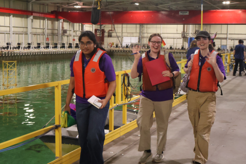 Maanasa, Ellen and Rowan walking away from an ROV demonstration