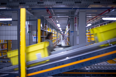 amazon crate on conveyor belt